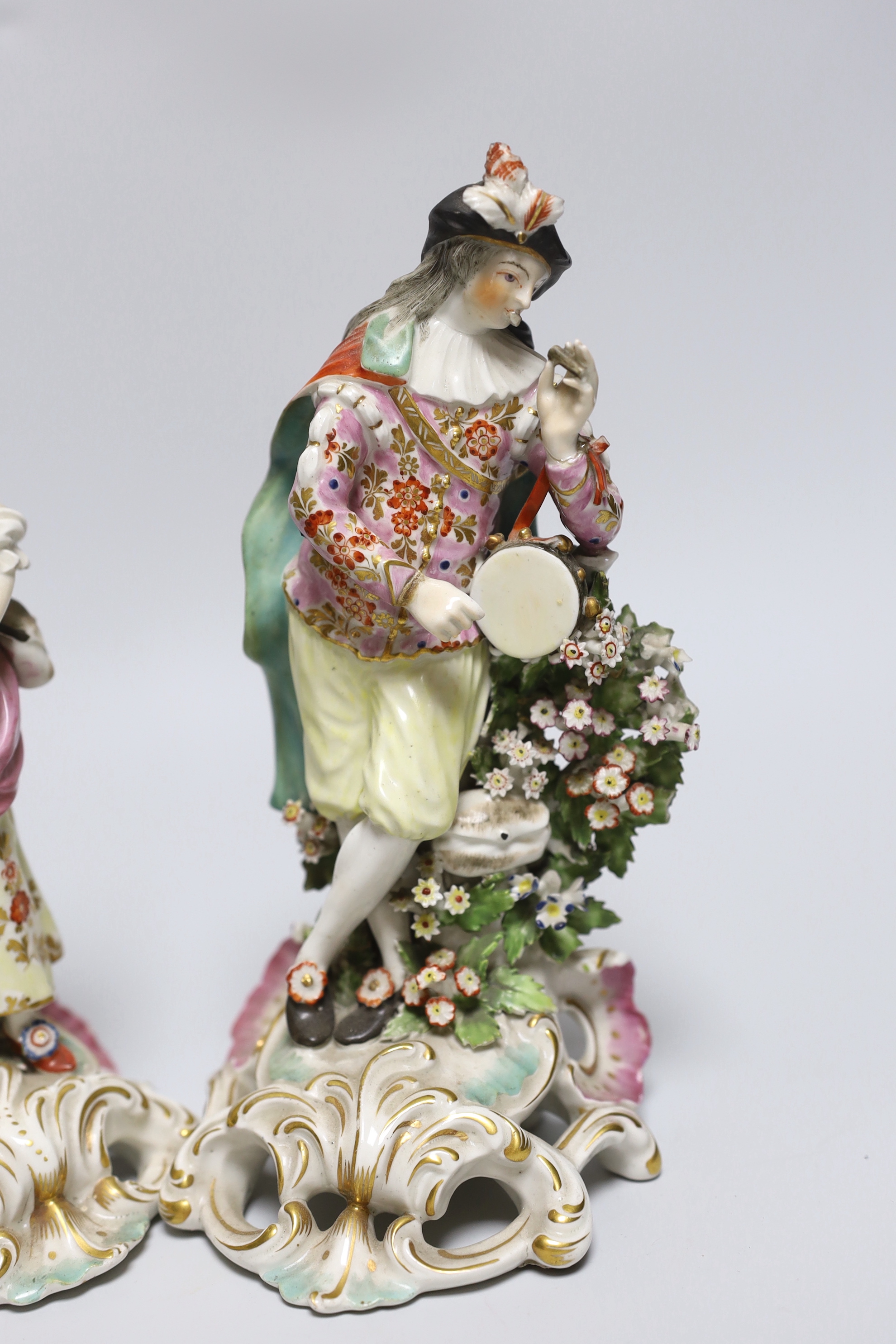 Two 18th century Derby ceramic musicians, 21cm